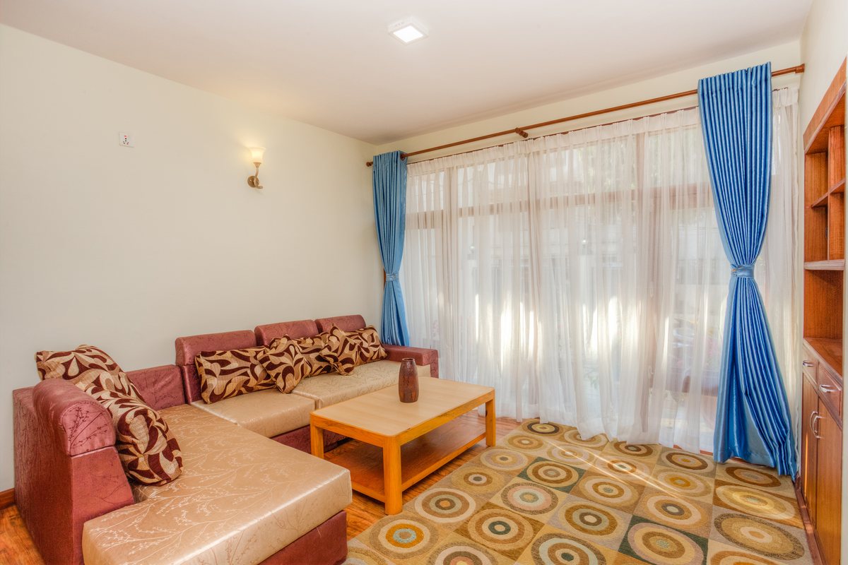 Annapurna Suite bright living area with garden view