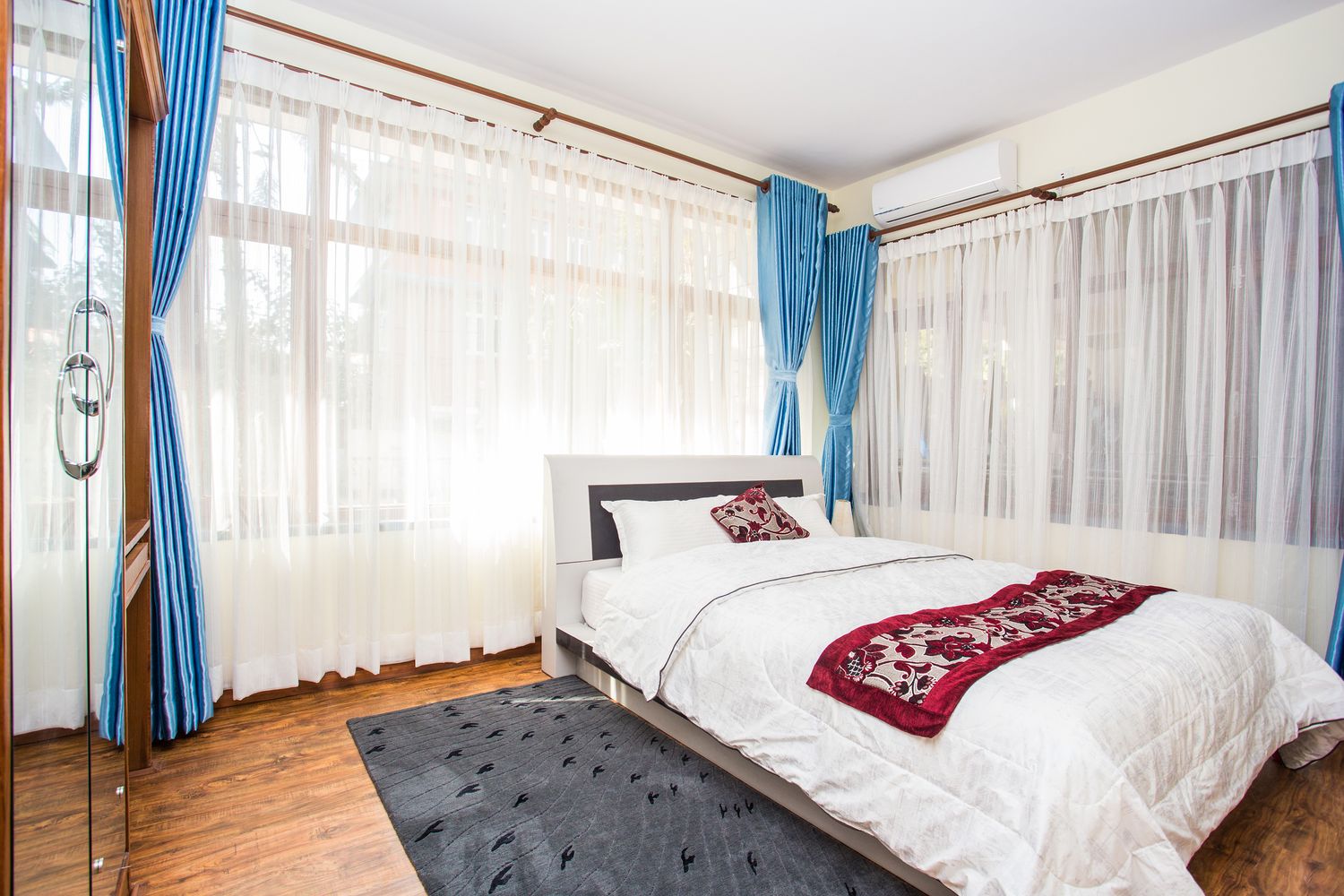 Annapurna Suite — the bedroom, bright and air-conditioned