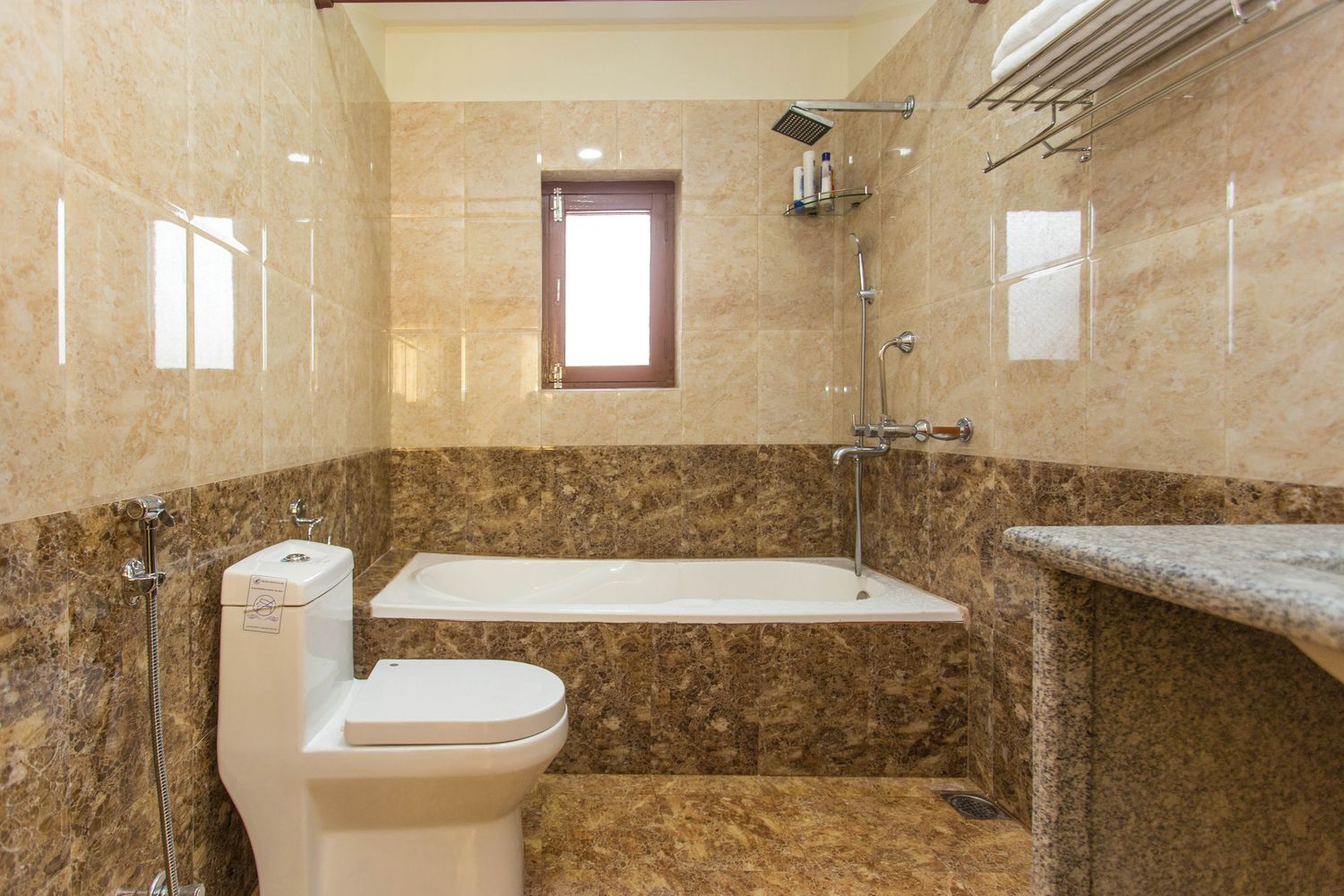 Kanchenjunga Suite — en-suite bathroom with bathtub & rain shower