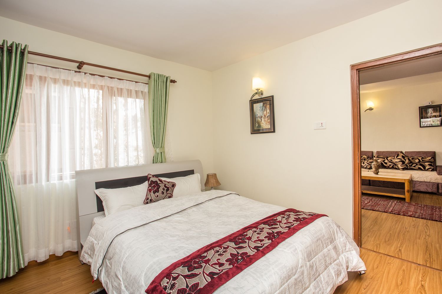 Lhotse Suite — private bedroom, opening to the living area