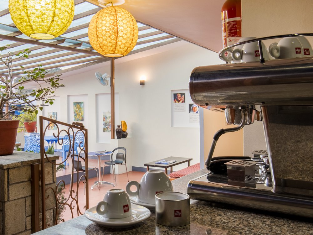 Espresso machine on the rooftop terrace with fresh coffee